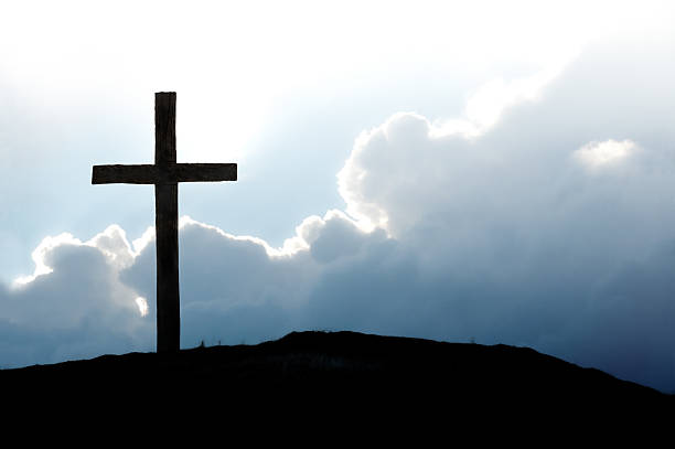 Christian Cross on Hilltop A beautiful background of the Christian cross. self sacrifice stock pictures, royalty-free photos & images