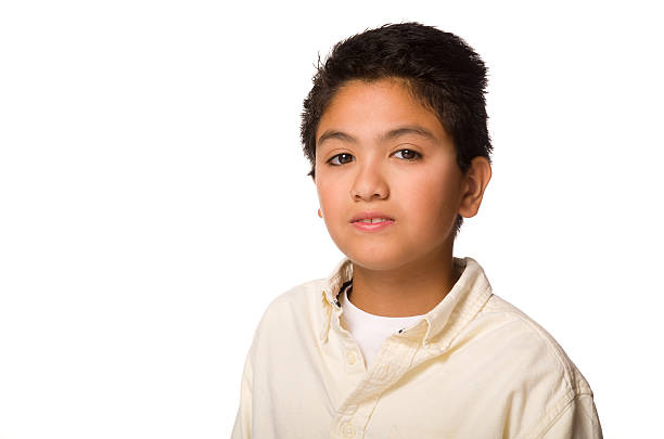 Portait of Young Tan Boy in Studio stock photo
