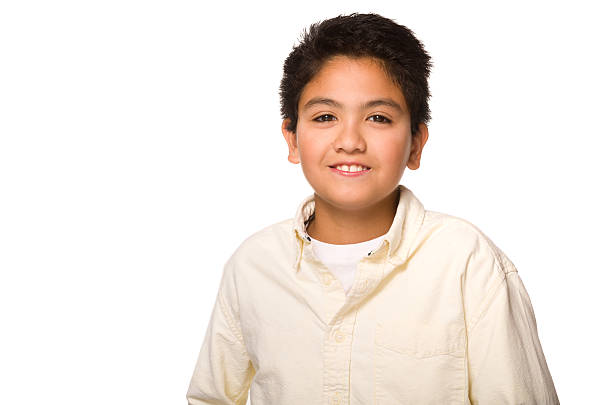 Young Cute Boy Smiling and Looking at Camera stock photo