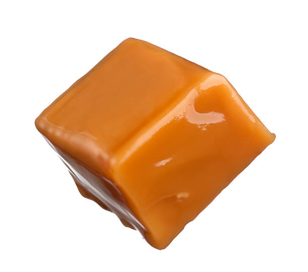 Caramel Caramel morsel on white.  Please see my portfolio for other food related images. caramel photos stock pictures, royalty-free photos & images