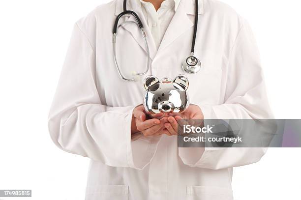 Doctor With Piggy Bank Stock Photo - Download Image Now - Care, Currency, Doctor
