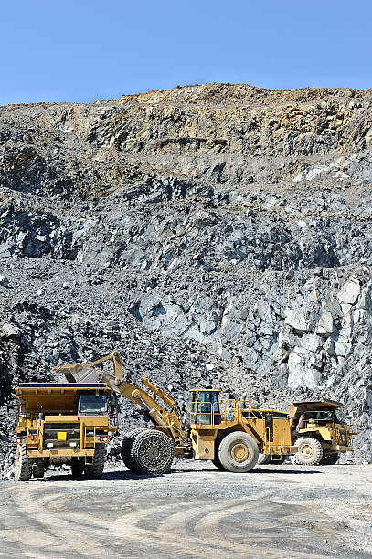istock Mining truck loaded in open pit gravel mine 174985846