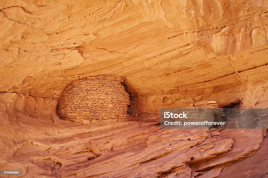 Honeymoon Arch Ruins in Mystery Valley - Monument.Valley Honeymoon Arch Ruins on the Mystery Valley side of Monument Valley on Navajo land in Arizona, USA. Building Exterior Stock Photo