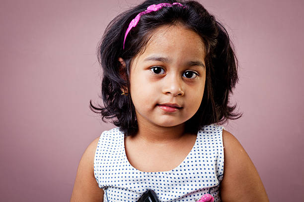 Portrait Of Pensive Indian Baby Girl Stock Photo - Download Image Now -  Culture of India, Girls, Looking At Camera - iStock