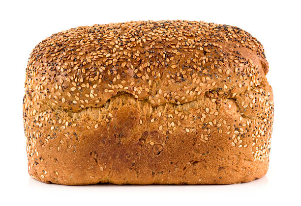 istock Wholemeal seeded brown bread loaf on a white background 174986182