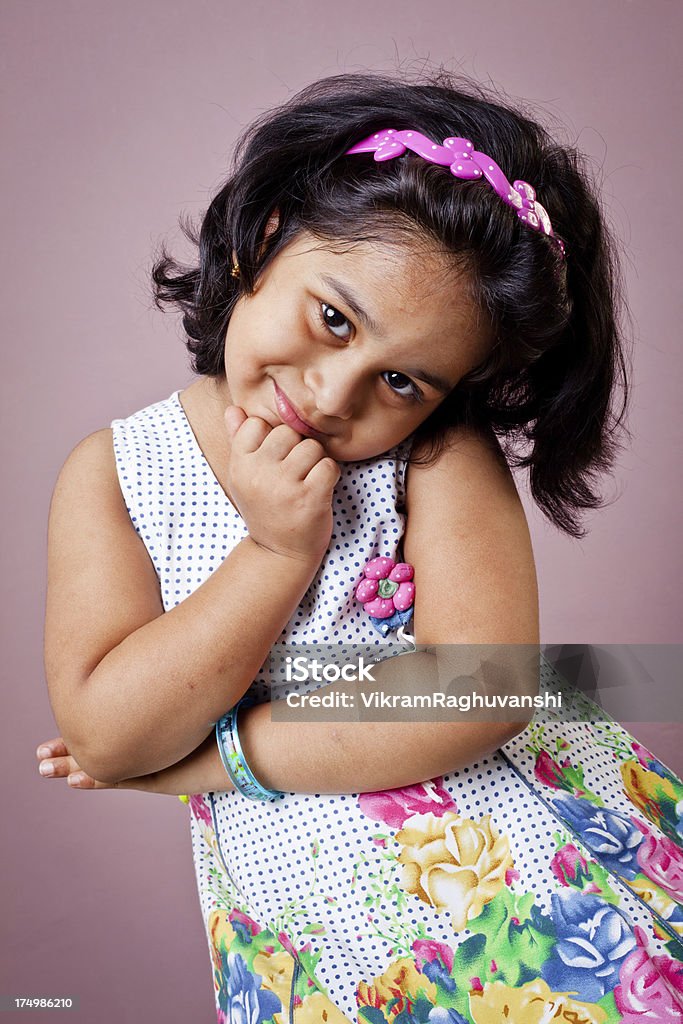 Portrait Of Cheerful Indian Baby Girl With Hands On Chin Stock Photo - Download Image Now - iStock Portrait Of Cheerful Indian Baby Girl With Hands On Chin Stock Photo - Download Image Now - iStock