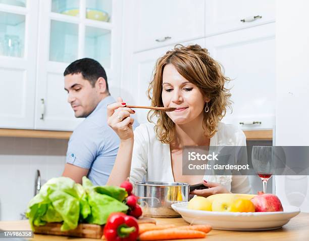 Tasting Food Stock Photo - Download Image Now - 30-34 Years, 30-39 Years, Adult