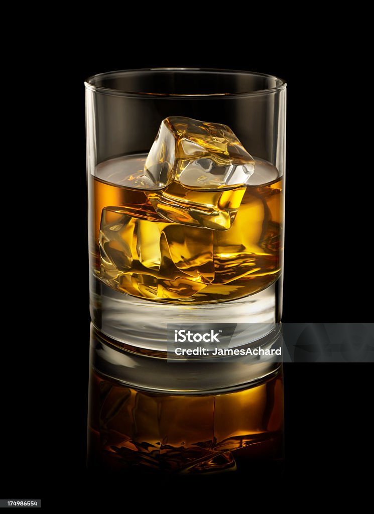 A Glass Of Whiskey On The Rocks Stock Photo - Download Image Now - Whiskey,  Drinking Glass, Black Background - iStock