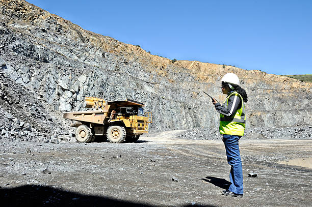 istock Female mine official supervising 174986739