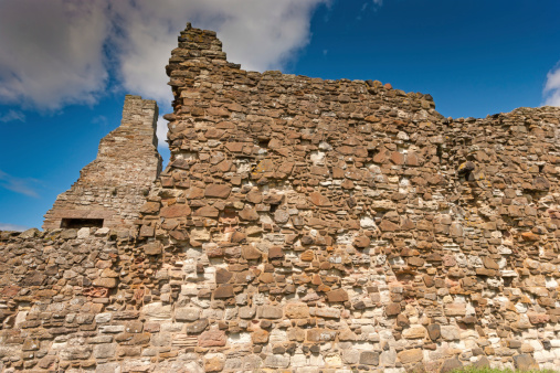 Stone wall on the flanks of the Lindisfarne Priory ruins.