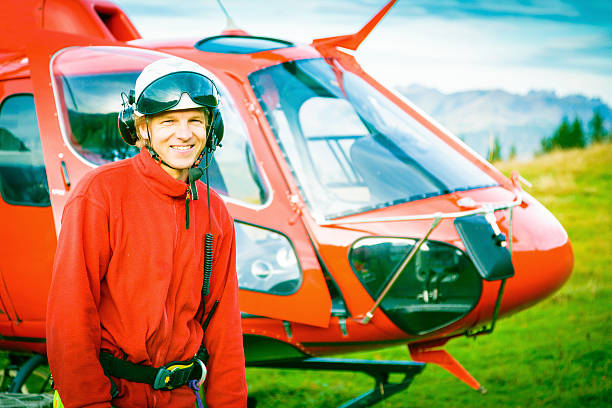 istock paramedic standing by his helicopter 174987008
