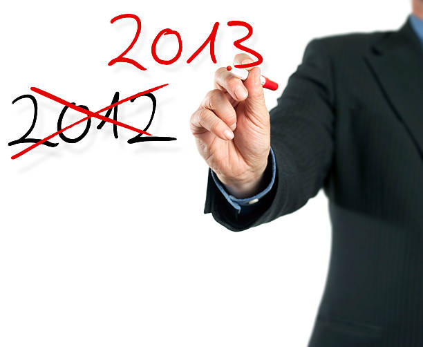 istock Hand writing on imaginary screen - Turn of the Year 174988015