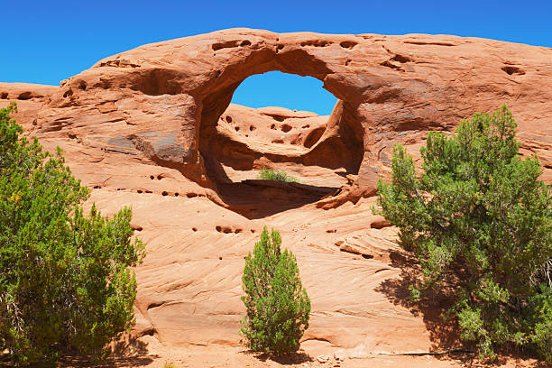 Honeymoon Arch on the Mystery Valley side of Monument Valley on Navajo land in Arizona, USA.
