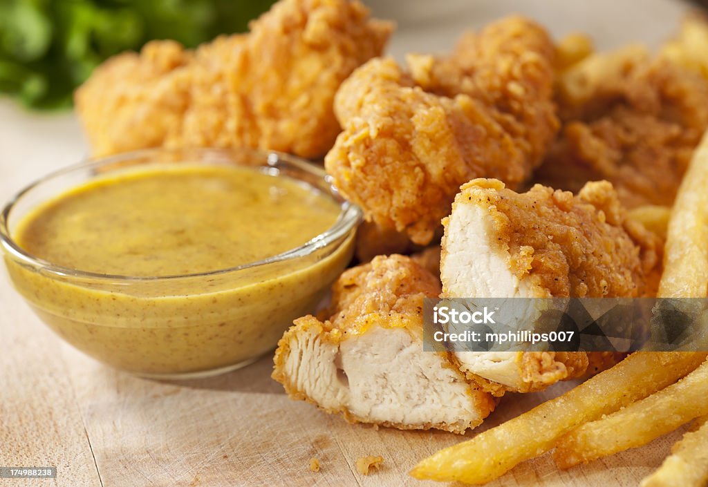 Pollo los dedos - Foto de stock de Pollo frito libre de derechos