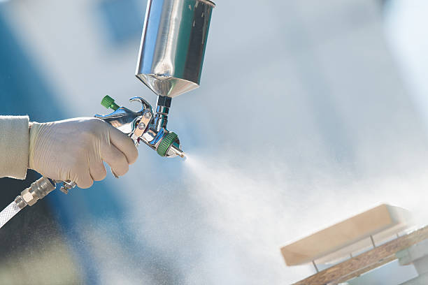 istock Industrial spray painting wood 174988636