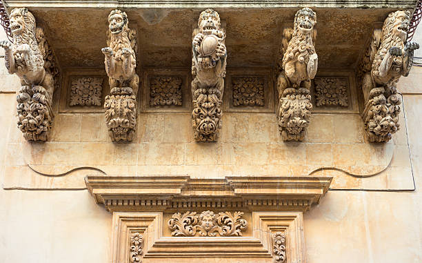 Sicily "Italy, Sicily, Noto, a baroque balcony of Nicolacci palace" noto sicily stock pictures, royalty-free photos & images