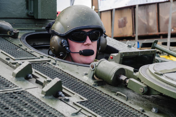 Soldier drives  tank vehicle
