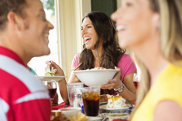istock Friends Having Healthy Lunch At Restaurant. 174989362