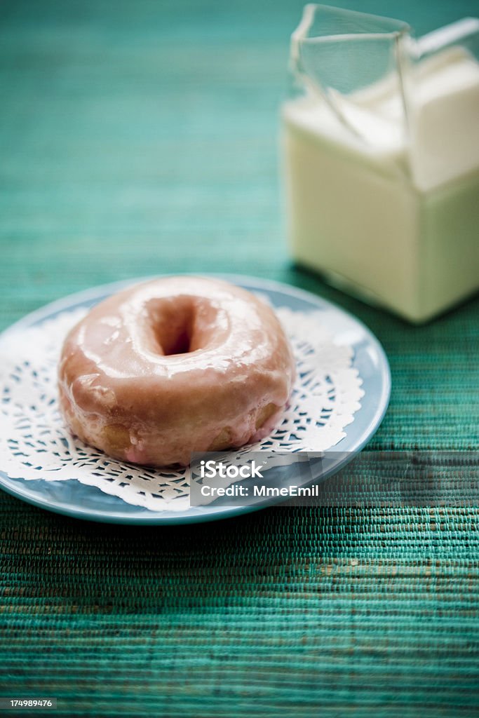Pink Donuts Pink frosted donuts and milk. Baking Stock Photo