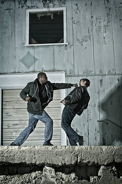 Punching and Backing Up in Kenpo Karate on the Street stock photo