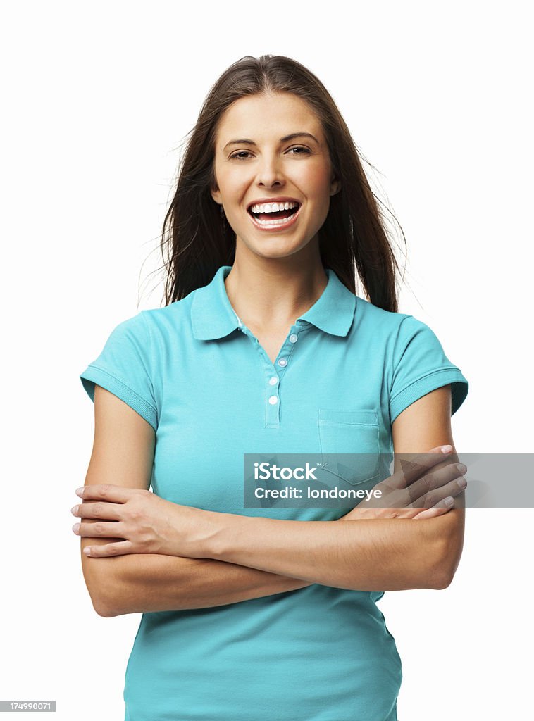 Joyful Woman With Arms Crossed - Isolated Portrait of joyful young woman in polo shirt with arms crossed. Vertical shot. Isolated on white. Polo Shirt Stock Photo