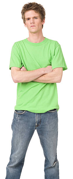 istock Serious Young Man Standing With Arms Crossed 174990409