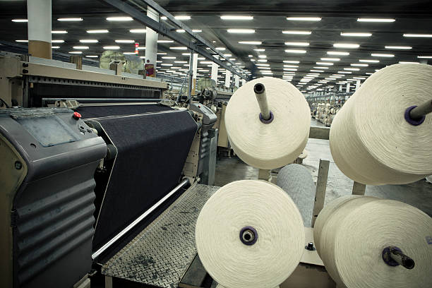 istock Denim Textile Industry - Jeans on Airjet Weaving Looms 174990735