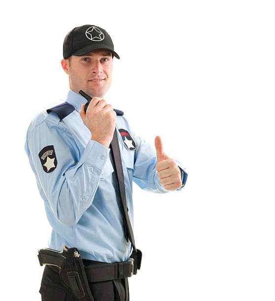 Security Guard Security guard is talking with walkie-talkie. security guard uniforms pictures stock pictures, royalty-free photos & images