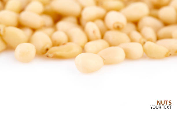 Peeled peanuts on a white background. Healthy food. Nuts.