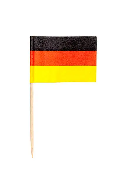 German paper toothpick flag. Nice paper texture. Isolated on white.