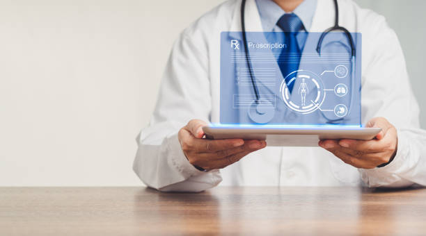 istock Doctor in a uniform shows a report prescription on a virtual screen with a tablet while sitting at the table 1749922375