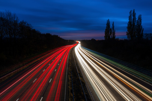 A wide angle view of motorway lights under a dusk sky. XL image size.