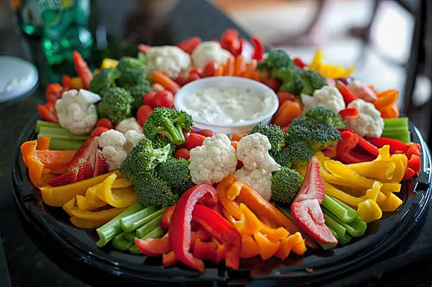 Photo of A vegetable tray with broccoli, cauliflower and pepper 