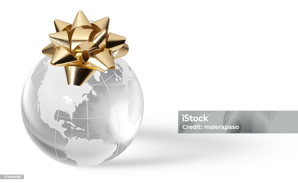 Globe with golden bow Globe with golden bow.Similar pictures from my portfolio: Globe - Navigational Equipment Stock Photo