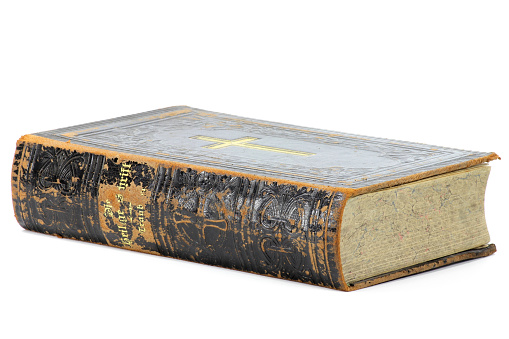 vintage German bible isolated on white background