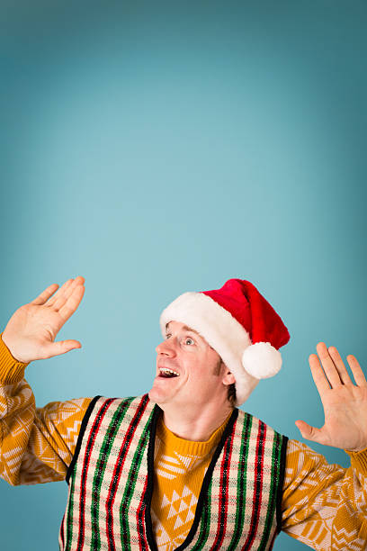 istock Excited Man Wearing Santa Hat and Ready to Party 174993694