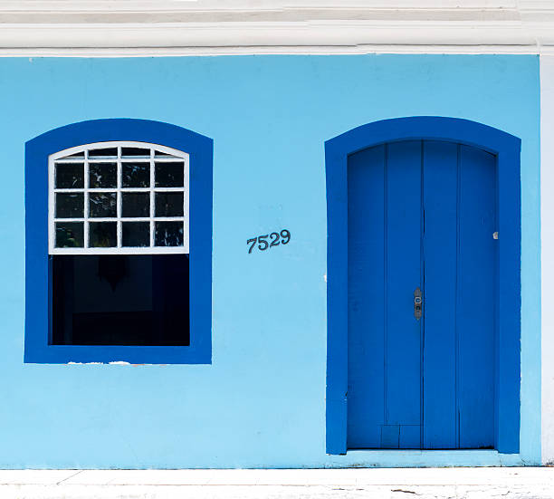 Blue front of traditional fishermen's house in Florianopolis, Brazil. stock photo