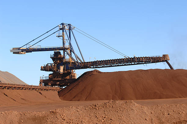istock Iron ore stacker pouring ore onto a stockpile. 174993898