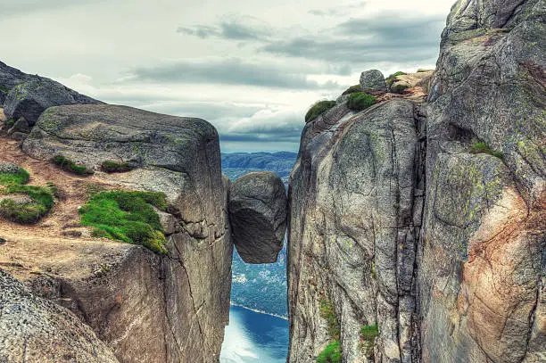 Photo of Kjerag Kjeragbolten rock in Kjerag Mountains, Norway