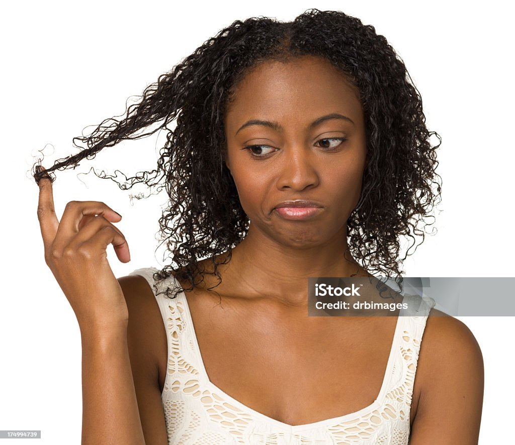 Aburrido mujer joven jugando con su cabello - Foto de stock de Rotar libre de derechos