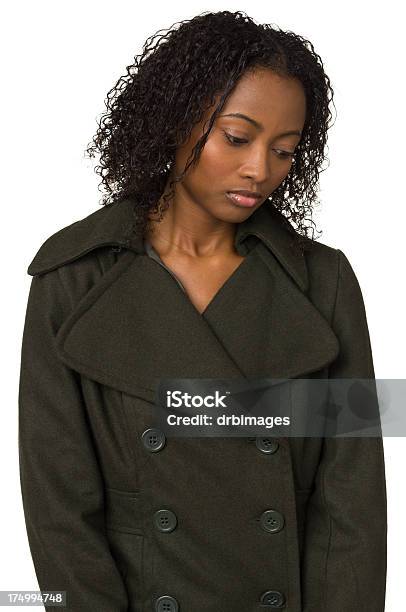 Sad Young Woman Looking Down Stock Photo - Download Image Now - 20-24 Years, 20-29 Years, 25-29 Years