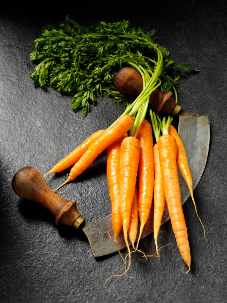 istock Carrots and Leaves with a Antique Mezzaluna 174994763