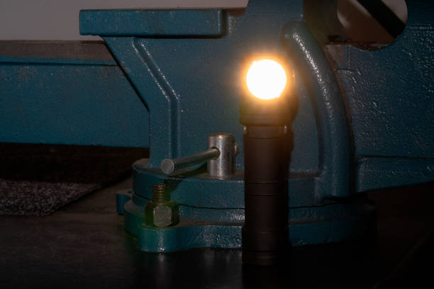 istock Workshop vice in the background and headlight  on in foreground 1749948011