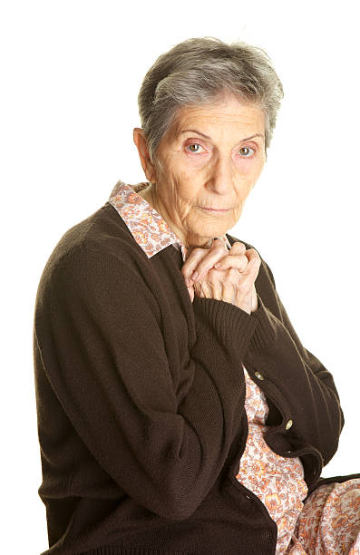 istock Sad or Lonely Elderly Woman on White Background 174994868