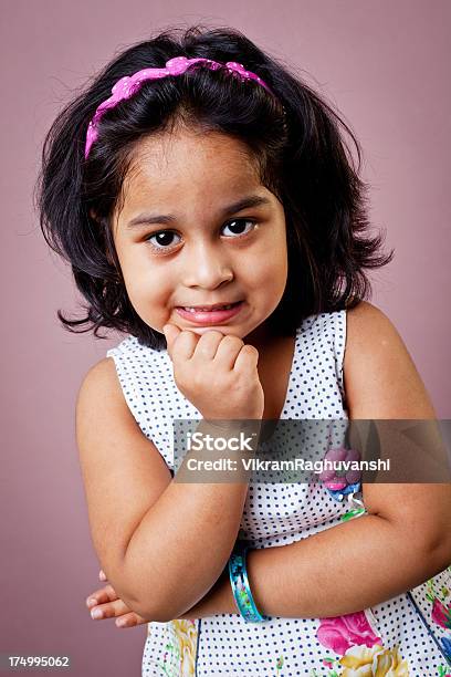 Portrait Of Cheerful Indian Baby Girl With Hands On Chin Stock Photo -  Download Image Now - iStock