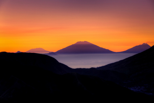 Volcano peak in Java at sunrise. Location: Dieng Plateau