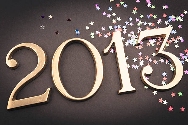 istock Gold 2013 New year text on christmas decoration 174996292