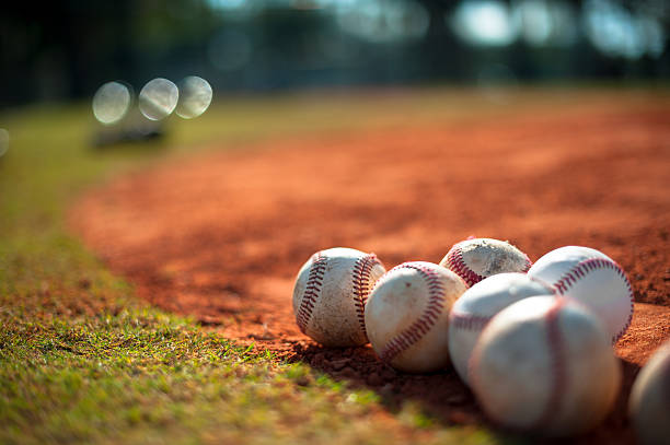 istock Little League Baseballs on Pitching Mound Close Up 174996467