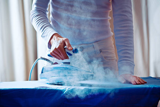 Woman Ironing Shirt