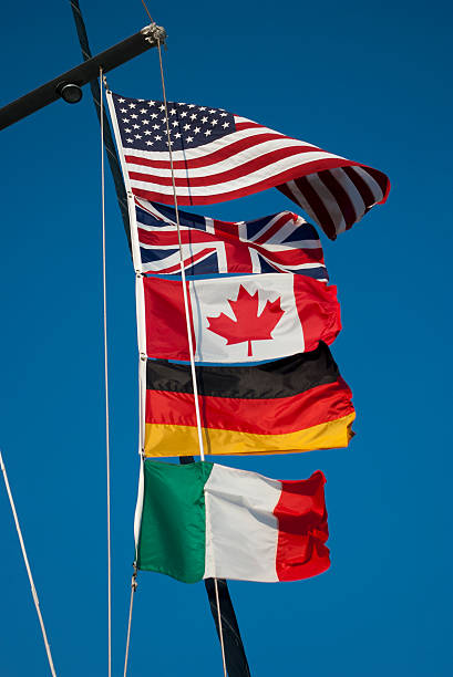 istock International Flags Wave above a sailing vessel 174996795